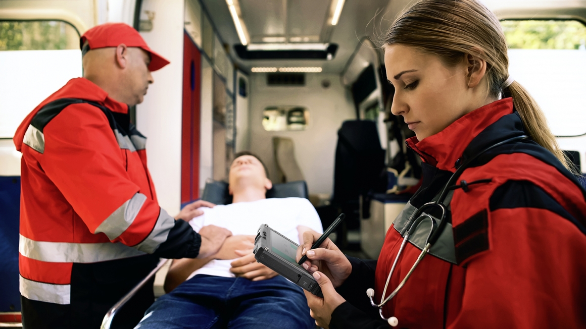 EMS paramedic working with the Getac UX10 - 1